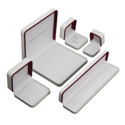 China Elelgent and New Logo Hot Stamping Wholesales Blue Custom Handmade Brushed PU Jewelry Travel Case Boxes for sale