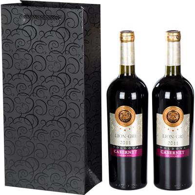 China Recycled materials blacken pattern wine paper bag single and double UV wine bottle packing thickened gift bag for sale