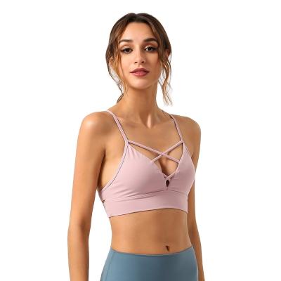 China 2021 Fitness Stretch Breathable Sexy Strappy Yoga Bra High Quality Four Way Breathable Sports Bras For Women for sale