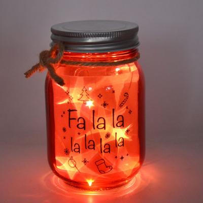 China Europe LED Lights Glass Crafts Red Glass Jar With Star Effect For Christmas Decoration for sale