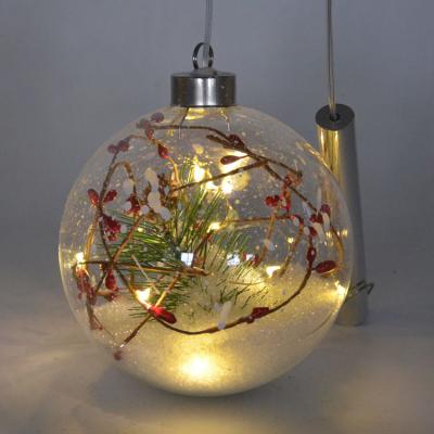 China Europe LED Lights Clear Glass Snow Ball With Red Ornament for sale