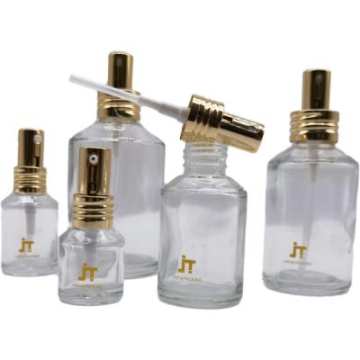 China Cosmetic Custom Design Clear Glass Bottle Cosmetic Glass Bottles Set For Liquid Base China Supplier for sale