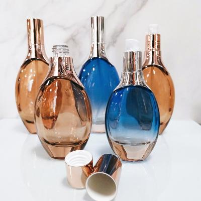 China Cosmetic factory selling blue oval glass bottle 30ml glass bottle you can add silk screen logo 100ml 50ml 30ml for sale