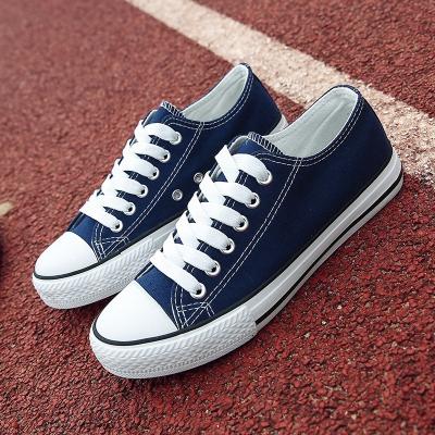 China 2022 fashion trend low tennis high top casual walking cut vulcanized canvas shoes girls sole rubber shoes fashion custom sneakers for sale