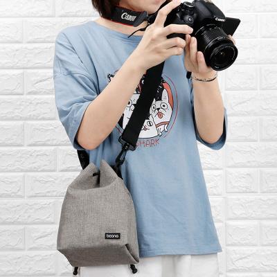 China Portable Wholesale Outdoor Durable Single Shoulder Oxford Canon Nikon DSLR Camera Bag Drawstring Pouch for sale