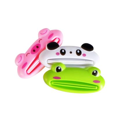 China Viable Creative Cute Cartoon Toothpaste Tube Rolling Holder Dispenser Animal Plastic Squeezer for sale