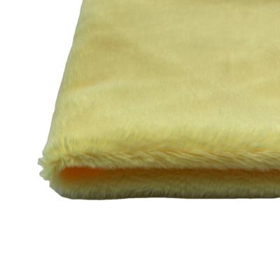 China Wholesale Tear-Resistant Fleece Textile Fabric Clothing Hairy Material In Yellow Color for sale