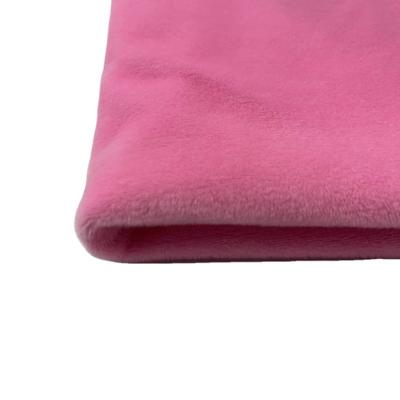 China Tear-resistant polyester fur tela terciopelo venta for soft toy fabrics in dark pink color for sale