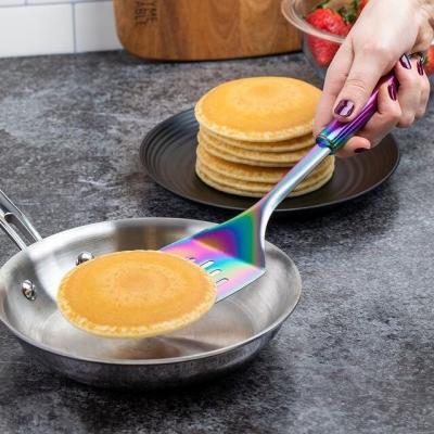 China Pretty Sustainable Rainbow Titanium Plated Cookware Set Stainless Steel Sturdy Cooking Slotted Turner for sale