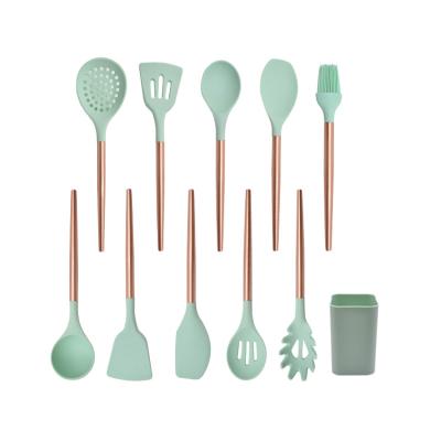 China Premiun Sustainable Copper Plated Handle Silicone 11 Pcs Kitchen Cookware Set With Plastic Holder for sale