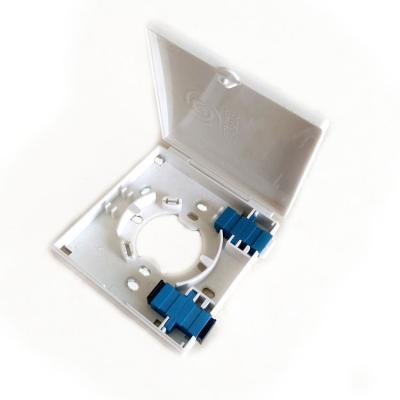 China Water And Dust Proof FTTH Terminal Box With 86 Type PVC Junction Box Wall Mount Panel Fiber Optic Termination SC Adapter Desktop Box for sale