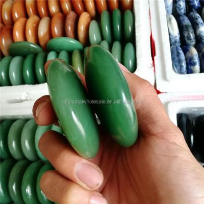 China China Natural Green Aventurine Palm Stone 6cm , UFO Shape Crystal Palm Stones for sale