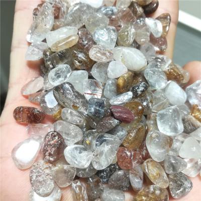 China Bulk Wholesale Europe Natural Polished Gold Rutilated Quartz Tumble Stones for sale