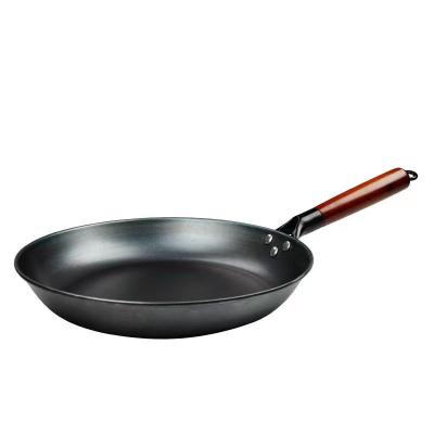 China Traditional Chinese style Chinese style traditional uncoated kitchen kitchenware household pancake fried steak cooked iron mahogany handle frying pan for sale