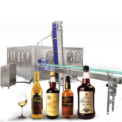 Cina Automatic Glass Bottle red wine alcohol drinks wash fill seal monoblock bottling plant machine manufacturer in vendita