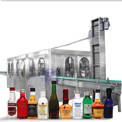 China Automatic alcohol grape wine rinsing filling capping machine Te koop