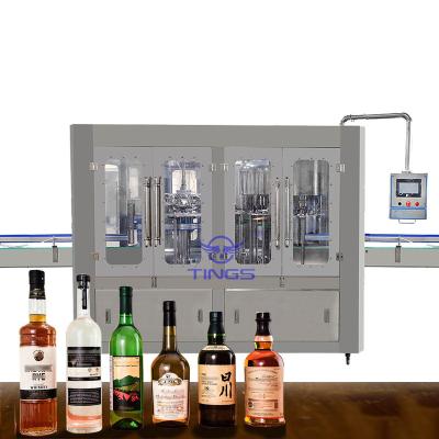 Κίνα Automatic Glass Bottle vodka Gins whiskey rinsing filling capping machine bottling equipmet προς πώληση