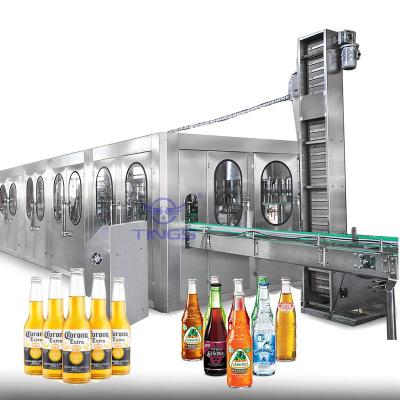 China Automatic Glass Bottle CSD drinks juice wines spirits washing filling capping machine bottling plant factory en venta