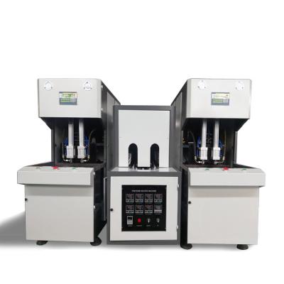 China Semi Automatic Bottle Blowing Machine/PET Plastic Bottle Making Machine/1500BPH Drinking Water Bottle Blowing Machine à venda