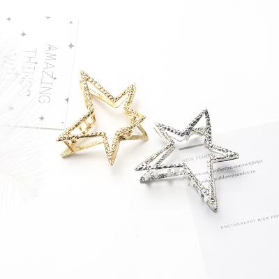 China Fashion Metal Star Hair Claw Clips Hollow-out Fashion Golden Hair Accessories For Women for sale