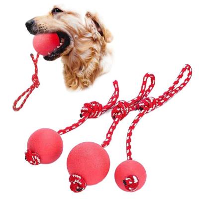 China Stocked Pet Toys Bite Resistant Molar Ball Training Interactive Funny Toys With Strong Elastic Rope Rubber Ball Ball for sale