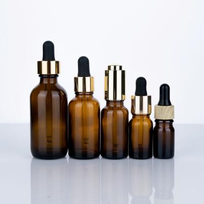 China 60ml/30ml/20ml/10ml/5mlcustom packaging essential oil glass bottle cosmetic luxury amber glass bottle for sale