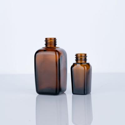 China Essential Oil Glass Bottle Cosmetic Custom Amber Luxury Glass Bottle for sale