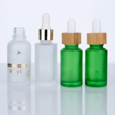 China Wholesale New Design Cosmetic Luxury Frosted White Green 30ml/25ml/20ml Dropper Bottle Skin Care Essential Oil Bottle for sale