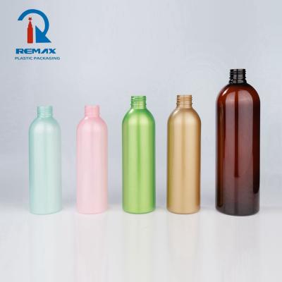 China Non Spill Wholesale Porcelain Goods Cylindrical Bottle Black Pet Cosmo Round Bottles Empty Plastic Bottle for sale