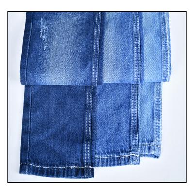 China High quality breathable fashion style cross waist denim fabric for jeans denim fabric for man and women for sale