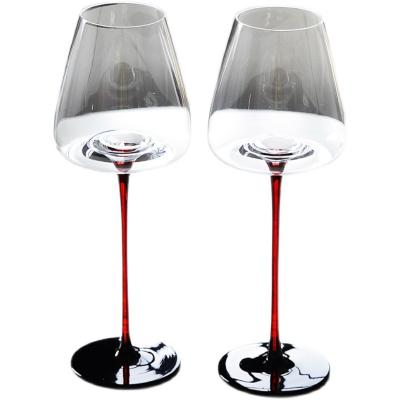 China Art Decor Big Belly Home Use Black Bow Tie Crystal Red Wine Glass Burgundy Set Rod Red Luxury High Feet Light for sale