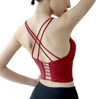 China QUICK DRY thin shoulder straps cross back lovely sports underwear yoga clothes new women's fitness bra yoga backless vest for sale