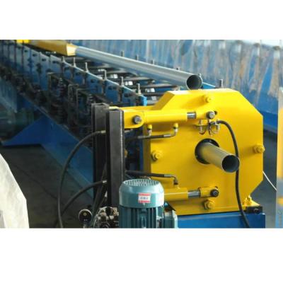 China Hotels Around Type Roof Rain Water Downspout Steel Pipe Roll Forming Machinery With Elbow And Seam Machine for sale