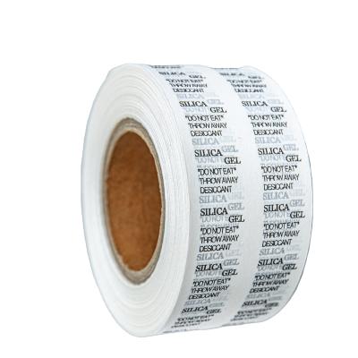 China Raincoat ; Moisture proof; Double Sided Packaging Silica Gel Desiccant Bag Desiccant Adhesive Drying Paper Paper for sale