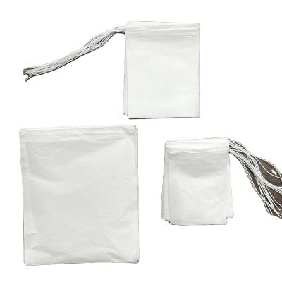 China Food Package Empty White Color Tea Bag Disposable Food Grade Filter Paper For Tea Packaging With Thread for sale