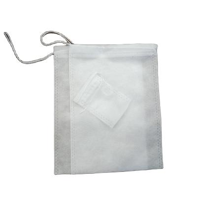 China Nonwoven Soup Gauze Filter Bag With Drawstrings Food Pack Heat Seal Filter Tea Bags for sale