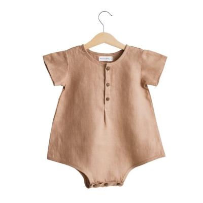 China Substantial Eco-friendly Washable Breathable Cotton And Linen Short Sleeve Baby Romper Summer Toddler Solid Bodysuit With Button for sale