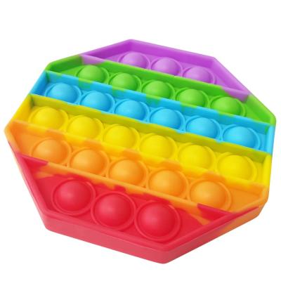 China BPA Free Shaker Toys New Decompress Toys Push Up Rainbow Bubble Silicone Stress Reliever Squeeze Bubble Shaker Toys for sale