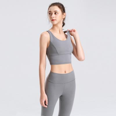 China Sustainable Women Workout Sets Fitness Apparel 2 Piece Yoga Set Gym Exercise Seamless Yoga Leggings Sports Bra Activewear for sale