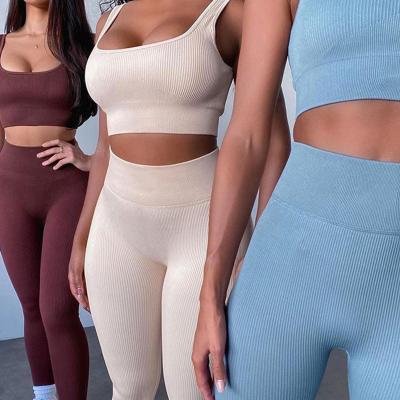 China Seamless Knitted Sexy Sports Tank Top Trousers Gym Activewear Yoga Pant Set Women for sale