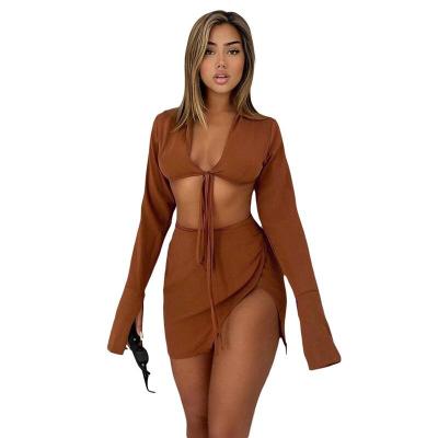 China Hot Sale Breathable Autumn Solid Color Long Sleeve Criss Cross Cut Out Skirt Dress Set For Women for sale