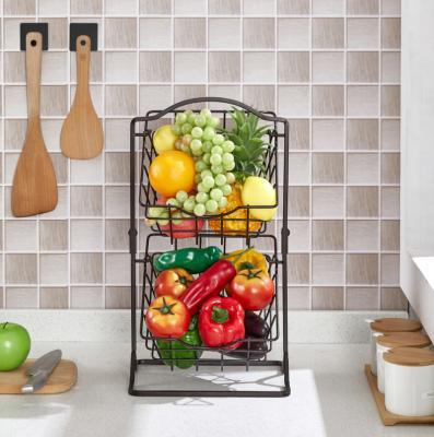 China Sustainable Creative double-layer portable iron fruit basket kitchen storage basket shelf storage basket for sale