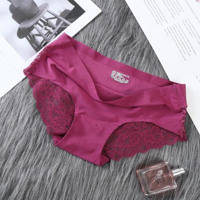 China Ladies Breathable Sexy Solid Lingerie Underwear Women Seamless Briefs Lace Up Panties for sale