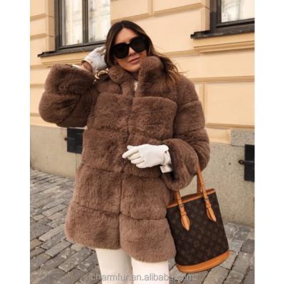 China Anti-Wrinkle Women Coats Faux Fur Jacket With High-Neck Design Wide Fur Panels Fashion Winter Clothing for sale