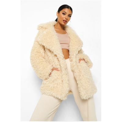 China Anti-Wrinkle Teddy Faux Fur Coat New Cross Season Posing With Latest Coats And Jackets for sale