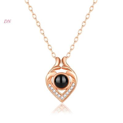 China Customize Dina Rose Gold Plated I Love You 100 Language Projection Crystal Heart Romantic Jewelry Chain Pendant Necklace For Women Gifts for sale