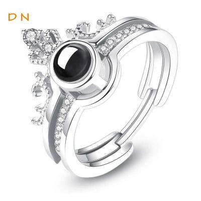 China Dina Fashion Customized Romantic Photo 100 Languages ​​Wedding Crystal Crown Open Rings Projection Jewelry Women Engagement Set for sale