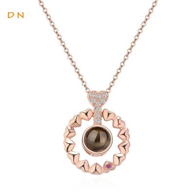 China Dina 2021 TRENDY Women's Fashion Memory Of Love Heart Charm Choker Necklace Projection Round Shape Jewelry Necklace 100 Dangling Tongues for sale