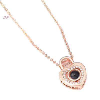 China Dina Wholesale Fashion Jewelry Women's 100 Tongue Rose Gold Plated Heart Lock Necklace Charm Necklace Jewelry For Couples Gifts for sale