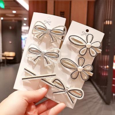 China Soft Popular Diamond Pearl Bow Style Hair Clip Bangs Full Style Hair Clip for sale